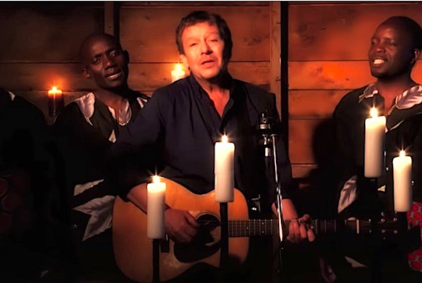 Lennie Gallant with Black Umfolosi from the video for Christmas Day on Planet Earth.