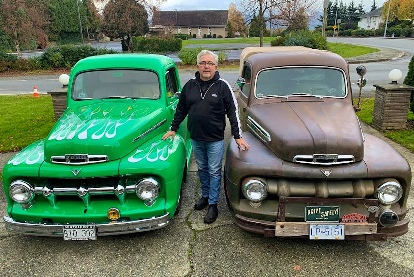 Terry Friesen with his pair of 1951 pickup trucks: a Ford and a Canadian-built Mercury. Alyn Edwards/Postmedia News