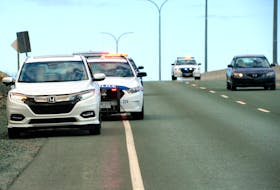 In this file photo from May 2021, the Royal Newfoundland Constabulary stopped vehicles during a speed enforcement operation. in St. John's In the space of about two hours, officers ticketed approximately three dozen drivers for speeding, with one driver clocked at 126 kilometres per hour or 46 kilometres per hour over the speed limit. 

Keith Gosse/Telegram file photo


