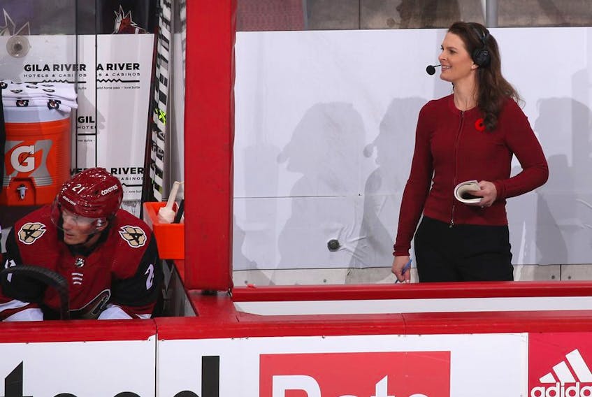  Broadcaster Jennifer Botterill reports during the NHL game between the Arizona Coyotes and the Minnesota Wild at Gila River Arena on Nov. 10, 2021 in Glendale, Arizona.