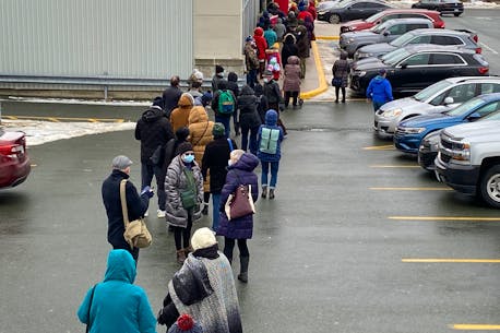 People waiting hours for walk-in COVID-19 vaccine booster shots at St. John's drugstore