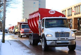 Around 40 potato trucks rolled through the main streets of Charlottetown on Dec. 20 blasting their horns in support of the Island's potato industry, which is facing financial trouble after Island potatoes were banned from the U.S. market.