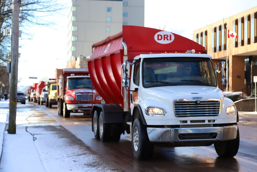 Around 40 potato trucks rolled through the main streets of Charlottetown on Dec. 20 blasting their horns in support of the Island's potato industry, which is facing financial trouble after Island potatoes were banned from the U.S. market.