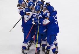 Slovakia celebrates a goal against Canada in the International Ice Hockey Federation world junior championship on Dec. 27, 2020, in Edmonton.