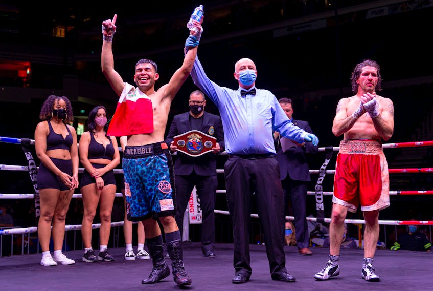 Jose Rodolfo Macias of Mexico (left) is declared the winner of the CPBC North American lightweight title fight after going the 10-round distance over Lower Sackville's Joey Laviolette at the Purenes Thrilla By the Hilla at Scotiabank Centre on Saturday night. - FIGHTING IRISH PROMOTIONS