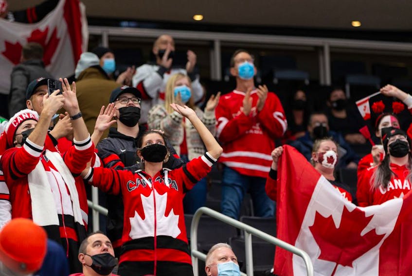 Team Canada fans celebrate Donovan Sebrango’s goal on Team Czechia’s goaltender Jakub Malek during first period IIHF World Junior Championship action at Rogers Place in Edmonton, on Sunday, Dec. 26, 2021. 