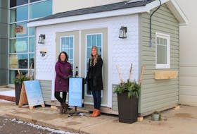 MaryEllen Hughes, left, director of philanthropy for the QEH Foundation, stands outside the Willow Shed with Sara Dykerman, owner of Plank & Pine Interior Design. 