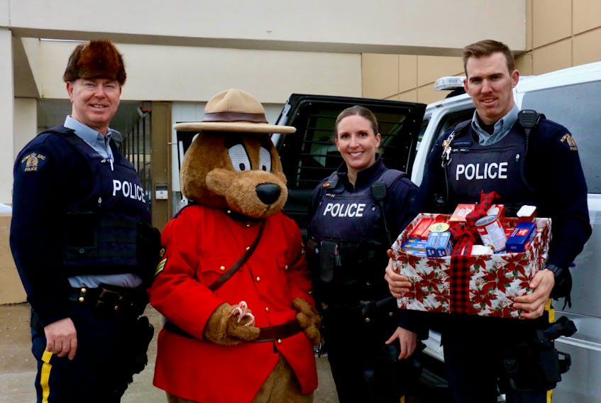 The RCMP’s Safety Bear joined constables Ian Murphy, Kate Sansom and Josh Kirkpatrick in spreading holiday cheer Dec. 11 while helping to collect donations for the Windsor food bank.