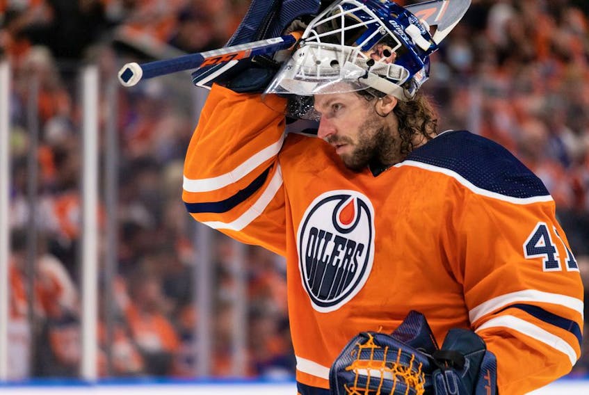 Edmonton Oilers goaltender Mike Smith (41) plays the Vancouver Canucks at Rogers Place in Edmonton on Oct. 13, 2021. 