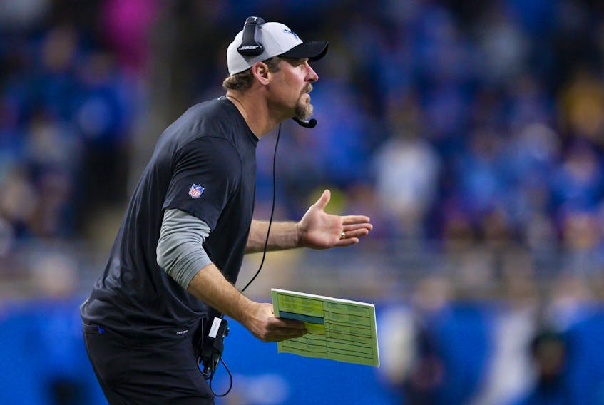 Detroit Lions head coach Dan Campbell gestures to a referee during the fourth quarter against the Chicago Bears.