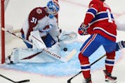 Montreal Canadiens' Josh Anderson (17) shoots puck on Colorado Avalanche goaltender Jonas Johansson during first period action in Montreal on Thursday, Dec. 2, 2021.