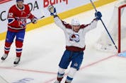 Colorado Avalanche's Valeri Nichushkin (13) celebrates his goal in front of Montreal Canadiens' Jonathan Drouin (92) during second period in Montreal on Thursday, Dec. 2, 2021. 