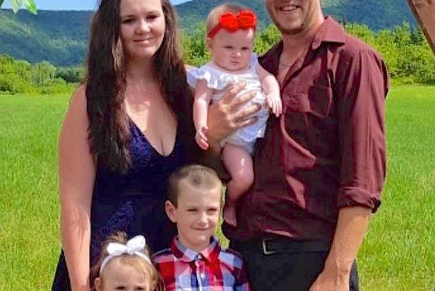 Jenna Ross, her fiance Cory Christie and their children Kenzie, from left, Kyle and Alexis. Ross, 28, is suffering from idiopathic pulmonary hemorrhage, which is causing bleeding in both of her lungs. Contributed