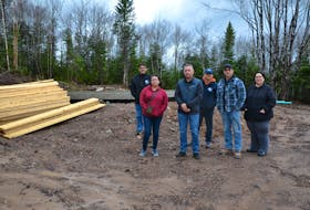 Members of Wagmatcook's leadership team stand at one of the sites being prepared for new homes. Pictured left to right are Tommy Peck, Cornelia Peck, Chief Norman Bernard, Peter Pierro, Lester Peck and Kim Pierro. Missing are Jamie Peck and Jason Pierro. ARDELLE REYNOLDS/CAPE BRETON POST