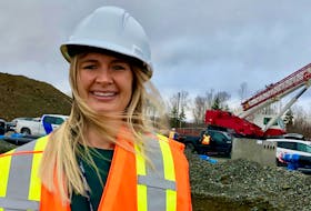 Leah Walsh-Wilton, who lost both her parents to cancer, was pleased to see the concrete poured on Friday for the new Cape Breton Cancer Centre. ELIZABETH PATTERSON/CAPE BRETON POST