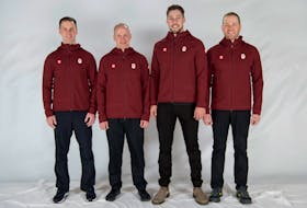The Candian men's Olympic curling team of (from left) Brad Gushue, Mark Nichols and Brett Gallant pose in one of the uniform kits they will wear at the 2022 Winter Games in Beijing. — Curling Canada photo