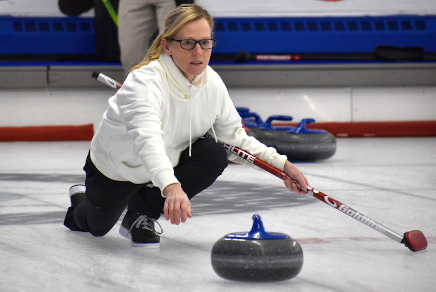 Heather MacKay of Team MacNeil leaves the hack and releases the stone during Wednesday Night Ladies League action at the Sydney Curling Club this week. The league has 13 teams this season. JEREMY FRASER • CAPE BRETON POST