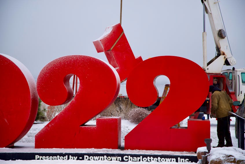 The large number one was hoisted onto a truck Dec. 30 after a new number two was set in place for the now 2022 new year sign on the waterfront near the Delta.
