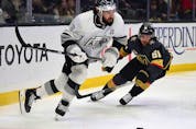  Los Angeles Kings defenceman Drew Doughty (8) moves the bpuck ahead of Vegas Golden Knights center Jonathan Marchessault (81) during the first period at Crypto.com Arena.