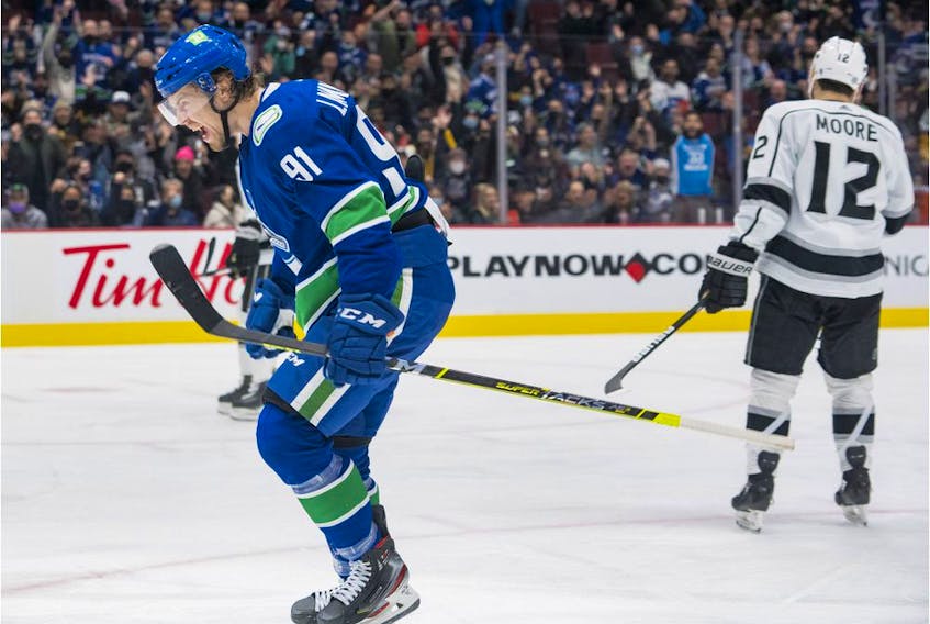  Vancouver Canucks forward Juho Lammikko (91) celebrates his first goal as a Canucks against the Los Angeles Kings in the third period at Rogers Arena. Vancouver won 4-0.