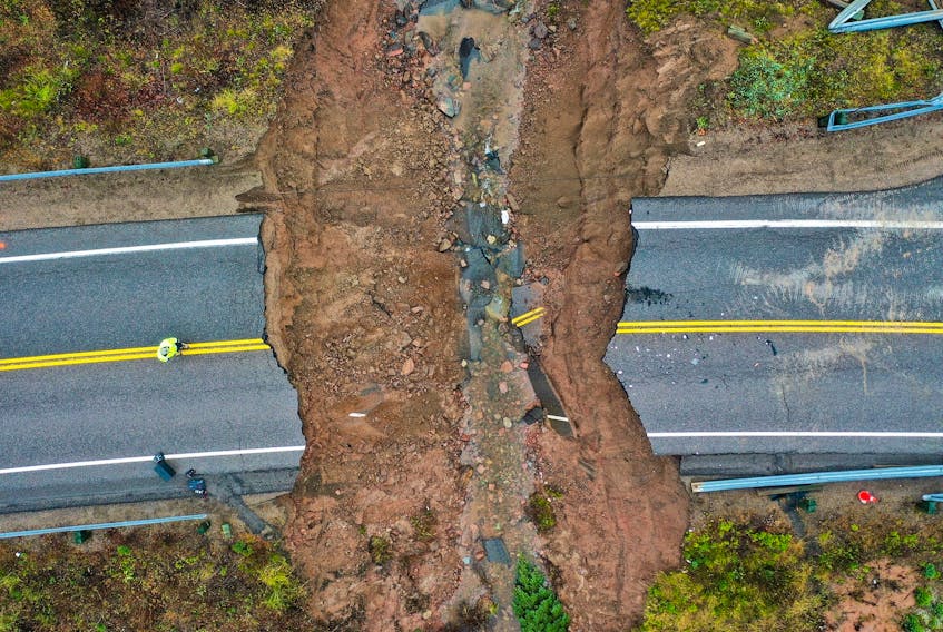 More than 260 mm of rain tore away part of the Cabot Trail at Marrach Brook, cutting off access between Ingonish and Neils Harbour during the Nov. 23-24 rain and wind storm. CONTRIBUTED  