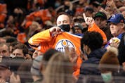  Only 23 per cent of respondents said they were already comfortable with attending events with large crowds, like this NHL game in Edmonton on December 16.