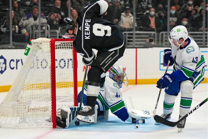  LA Kings centre Adrian Kempe (9) shoots the puck against Vancouver Canucks goaltender Jaroslav Halak (41) in the second period at Crypto.com Arena.