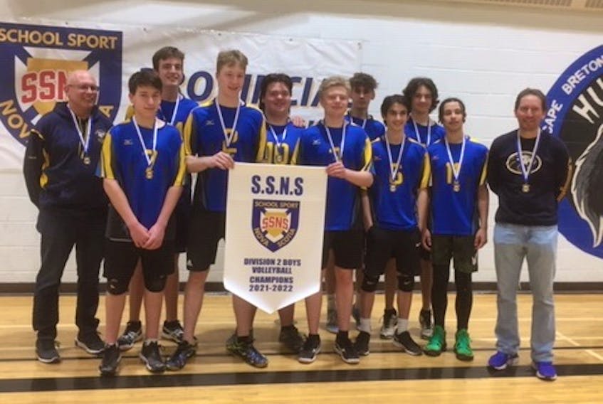 The Middleton Monarchs pose with the School Sport Nova Scotia Division 2 boy's volleyball banner.