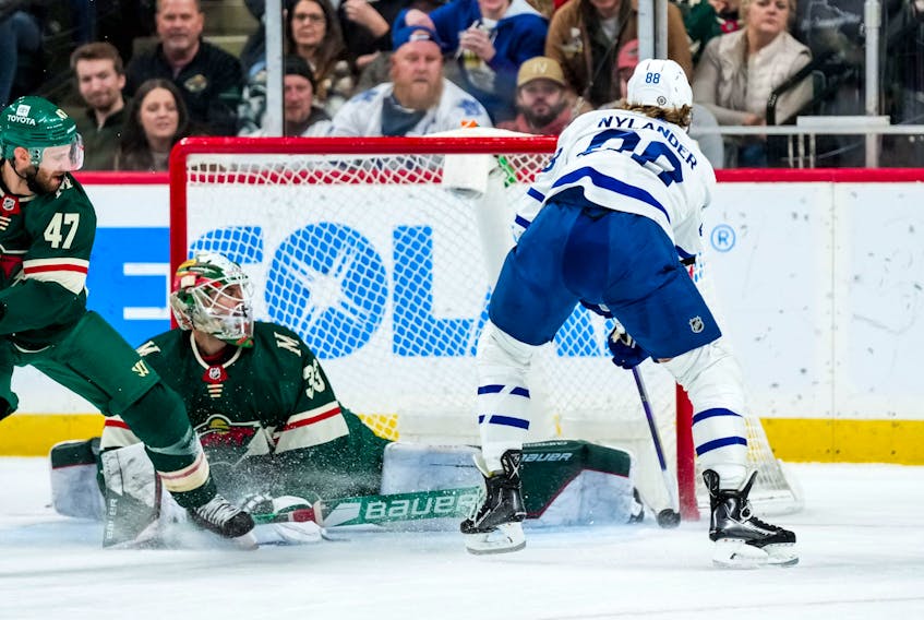 Minnesota Wild goalie Cam Talbot makes a save on Maple Leafs' forward William Nylander during the second period at Xcel Energy Center on Saturday, Dec. 4, 2021. 