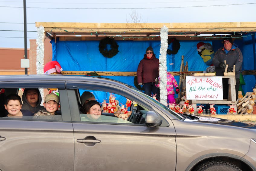 The town of Souris held its 41st annual Christmas Parade on Saturday, Dec. 4. The town held it as a reverse parade, where cars of attendees drive past stationary floats, in order to follow pandemic protocols.