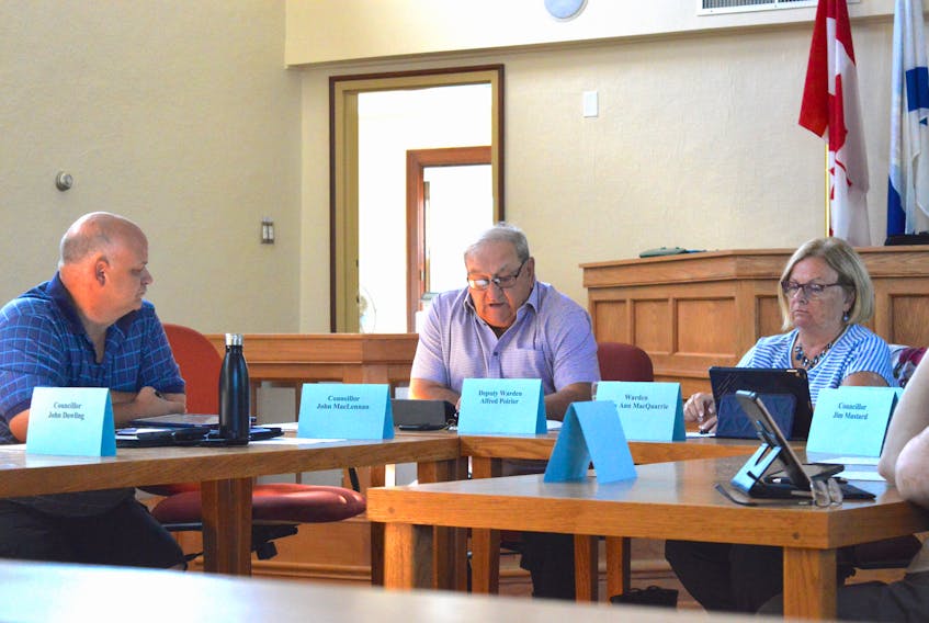 Alfred Poirier, centre, makes a point during an August 2019 committee of the whole meeting of Inverness municipal council with now-former councillor John Dowling, left, and former warden Betty Ann MacQuarrie looking on. Poirier served as deputy warden between 2016 and 2020. CAPE BRETON POST FILE