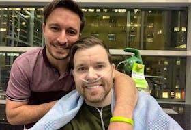 Steve Badcock (left) flew to Toronto in November to be with his husband, Jamie, and help him regain strength. Jamie is on a wait list for a double lung transplant. 