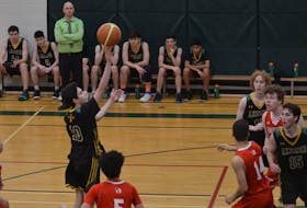 Jason Simmonds/Journal Pioneer File Photo
In this 2019 file photo, Three Oaks Axemen No. 1 team point guard point guard Vlersim Musliu releases a shot against the Charlottetown Rural Raiders during the championship game of the 2019 Three Oaks Senior High School Christmas Classic senior boys’ basketball tournament. After a break in 2020, the Christmas Classic is returning to TOSH this year, beginning on Friday, Dec. 10, and concluding the afternoon of Saturday, Dec. 11.