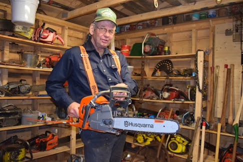 Keith Smith loves old chainsaws but he also likes many of the conveniences of today's models, such as automatic oilers, heated handlebars and, anti-vibration technology.