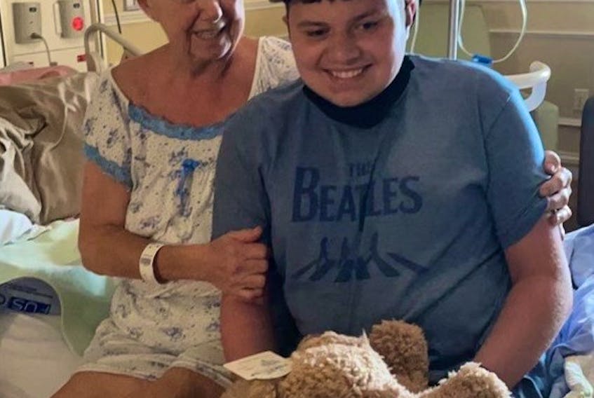 Callum Baldwin and his grandmother Rhonda McCallum admire the bear that will always remind Callum how much he is loved. Contributed