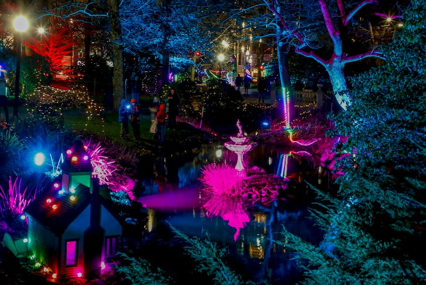 FOR NEWS STANDALONE:
People take in the Holiday Lights in the Public Gardens Tuesday December 7, 2021. The lights are open from 6-9 pm y=until January 1, 2022.

TIM KROCHAK PHOTO