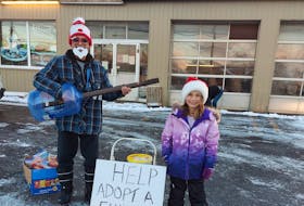 Bucky Walzake, who along with his granddaughter Peyton, raised $2,005.15 last year for Combined Christmas Giving by playing music and passing out treats. CONTRIBUTED