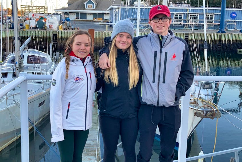 The Macaulay siblings - from left, Riley, 14, Finlay, 16, and 18-year-old Jackson - will compete in the upcoming Youth Sailing World Championships in Al Mussanah, Oman. - GLENN MacDONALD / SALTWIRE NETWORK