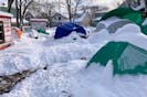 Most of the tents at Meagher Park in Halifax were partially snow-covered Thursday morning after the blizzard.