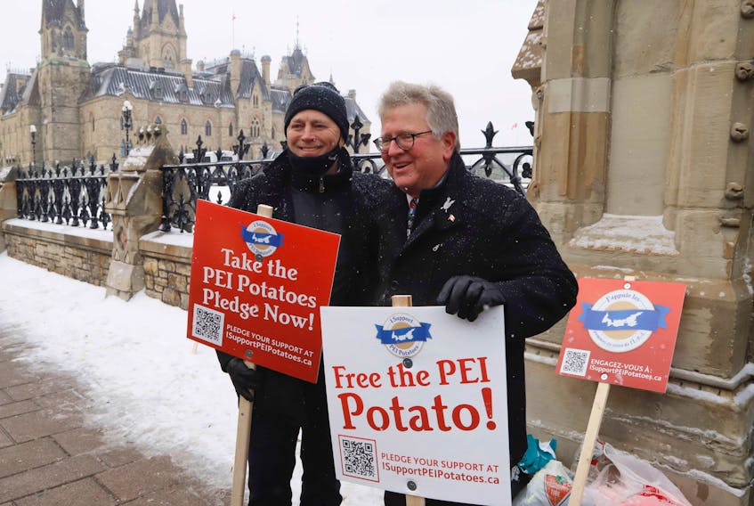 P.E.I. Premier and Senator Rob Black were among supporters gathered in front of Parliament Hill in Ottawa, Ont., on Dec. 8 handing out about 6,000 bags of P.E.I. potatoes as part of ongoing efforts to reverse a ban on exports to the U.S. King and Black were joined by P.E.I. Senators Brian Francis and Diane Griffin as well as members of the P.E.I. Potato Board, one of the organizers of the initiative.