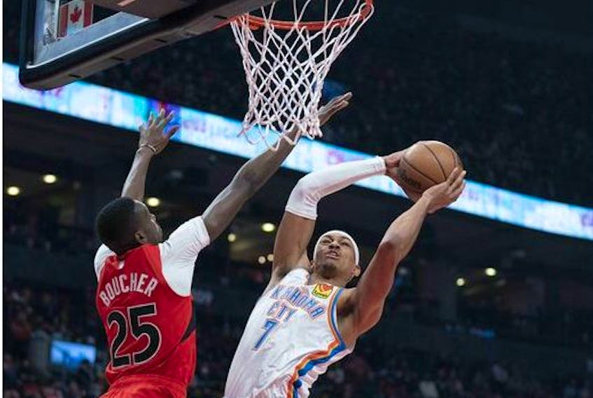 Oklahoma City Thunder forward Darius Bazley drive to the basket as Toronto Raptors forward Chris Boucher tries to defend during the first quarter at Scotiabank Arena. 