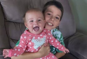 The novelty of his sister's Christmas arrival last year has not worn off for Trace Billett Gallant, who adores the fact his little sister Ariel was born on Dec. 25.