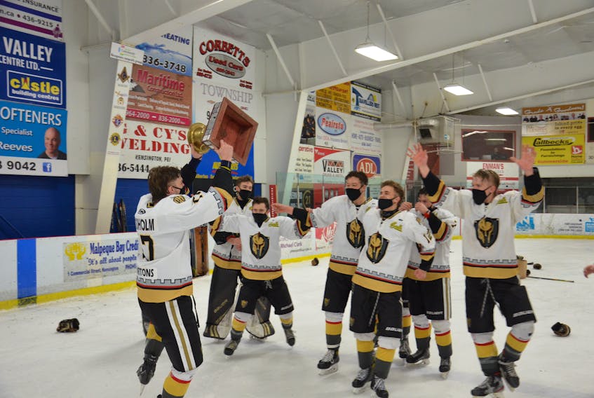 Charlottetown Bulk Carriers Knights captain Max Chisholm hoists the P.E.I. major under-18 hockey championship trophy. The Knights defeated the Kensington Monaghan Farms Wild 9-2 in Kensington on Saturday night to sweep the best-of-seven series.