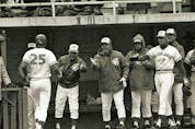  Doug Ault is congratulated in the dugout after he hits the first home run in Jays history on opening day 1977. MICHAEL PEAKE/SUN FILES