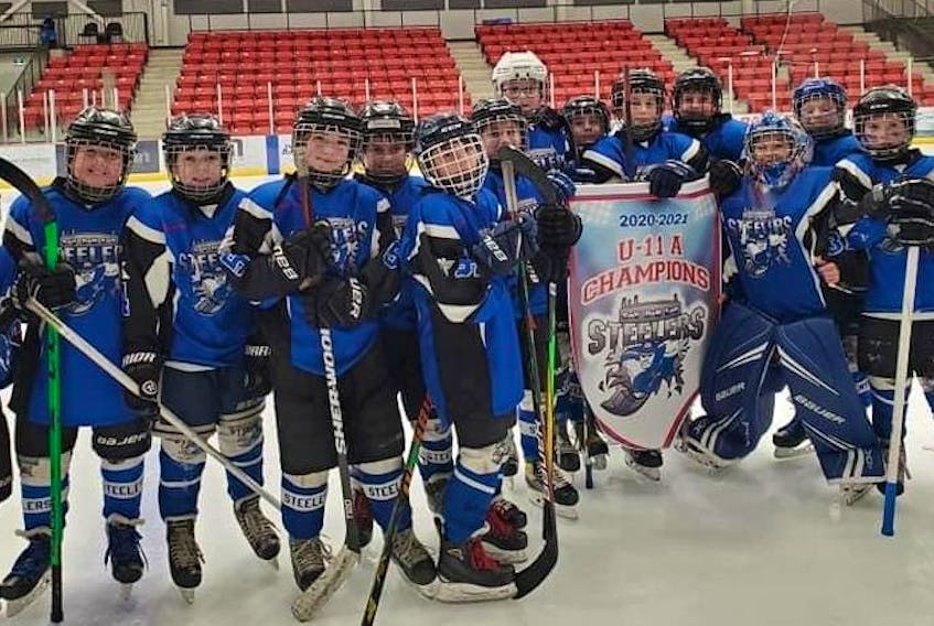 The Sydney Steelers captured the Cape Breton Under-11 'A' Hockey League championship, defeating the Cape Breton County Islanders 7-5 in the league final on March 20 at the Membertou Sport and Wellness Centre. Members of the team, not in order, Ethan Miller, Jamie Morrison, Tucker MacLeod, Rowan Carmichael, Matthew Hutt, Breslin Marshall, Joey Sylvester, Tyson Demone, Chase Windsor, Parker Lee, Peter Kozera, Colton Craig, Luke Andrea, Spencer Melski and Peyton MacKenzie. Missing from the photo were coaches Chris Carmichael, Martin Andrea and Derrick Demone. PHOTO SUBMITTED/SHARON YOUNG.
