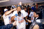  Veteran outfielder Dave Winfield celebrates after helping the Jays win the 1992 World Series. Despite a wonky knee, he did not want to miss opening day that year. SUN FILES