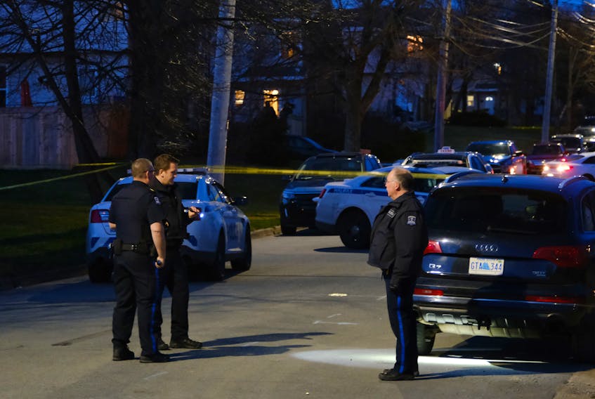 Halifax regional police are seen on Lahey Road at Clarence Street as they investigate reports of a shooting in Dartmouth Thursday evening April 8, 2021.
TIM KROCHAK PHOTO 