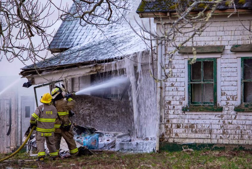 Firefighters had to tackle a blaze from the outside of an abandoned building in Wellington because of its condition. This was the second fire in four hours that firefighters from several departments responded to in the early morning hours of April 12. James Vaughan Photo