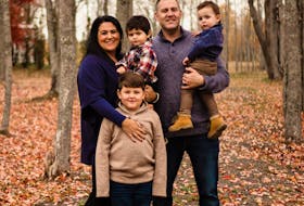 Carolynn Dubé, executive director of Fertility Matters Canada, with her three sons and husband Bryan. Originally a Coté from North Sydney, Dubé became involved in fertility advocacy, education and awareness after becoming a mom to three boys through in vitro fertilization treatment. The couple's sons, pictured here, are seven-year-old Bren and two-year-old twins Shae, in his mother's arms, and Theo, in his dad's. CONTRIBUTED 