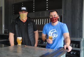 Friends Steve Martin, left, and Craig Farwell were co-organizers of the Newfoundland Craft Beer Festival before they decided to open a new bar and eatery highlighting the province's many breweries. — Andrew Robinson/The Telegram